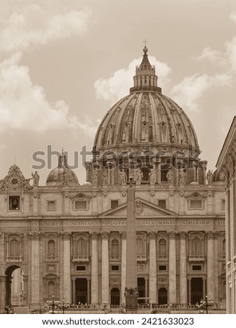 Black and white sepia tone photography. Vatican City with Obelisk and famous St. Peter's Basilica in the St. Peter's Square. Rome, Italy.