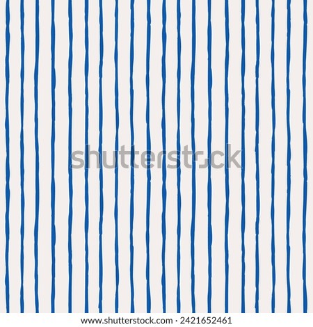 Vertical striped pattern. Blue hand drawn pattern on white background. Thin stripes. Irregular lines design. Graphic print fashion trend 2024