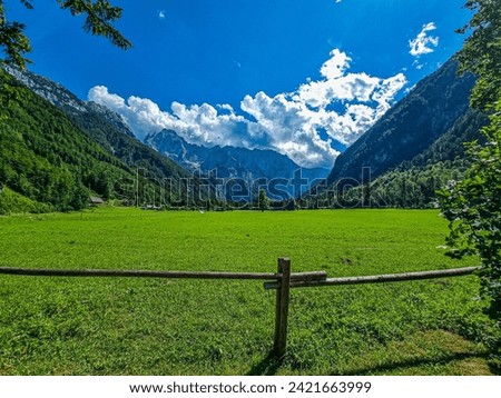 View of the Logar Valley in Slovenia, the most beautiful glacial valley in the Alps. Natural sunlight. Royalty-Free Stock Photo #2421663999