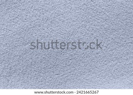 Snow white felt fabric background. Surface of fabric texture in white winter color.