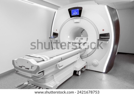 Medical CT or MRI or PET Scan Standing in the Modern Hospital Laboratory. CT Scanner, Pet Scanner in hospital in radiography center. MRI machine for magnetic resonance imaging in hospital radiology	 Royalty-Free Stock Photo #2421678753