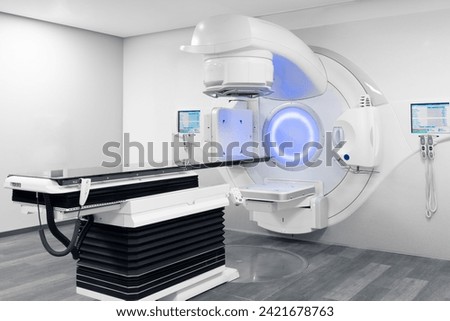 Cancer therapy, advanced medical linear accelerator in the therapeutic radiation oncology to treat patients with device. radiation oncology therapy device	 Royalty-Free Stock Photo #2421678763