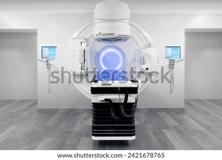 Cancer therapy, advanced medical linear accelerator in the therapeutic radiation oncology to treat patients with device. radiation oncology therapy device	 Royalty-Free Stock Photo #2421678765