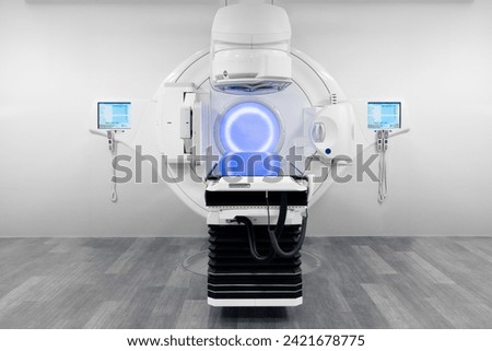 Cancer therapy, advanced medical linear accelerator in the therapeutic radiation oncology to treat patients with device. radiation oncology therapy device	 Royalty-Free Stock Photo #2421678775