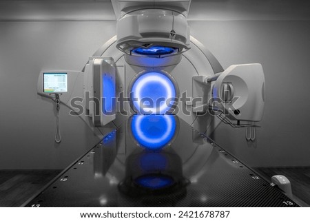 Cancer therapy, advanced medical linear accelerator in the therapeutic radiation oncology to treat patients with device. radiation oncology therapy device	 Royalty-Free Stock Photo #2421678787