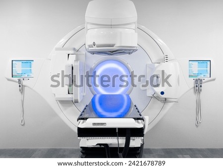 Cancer therapy, advanced medical linear accelerator in the therapeutic radiation oncology to treat patients with device. radiation oncology therapy device	 Royalty-Free Stock Photo #2421678789