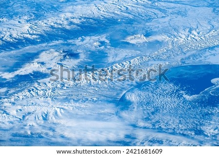 Aerial view of cloudscape in planet Earth atmosphere. Digital enhancement of an image by NASA 
