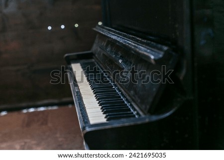 dusty old piano keyboard. High quality photo