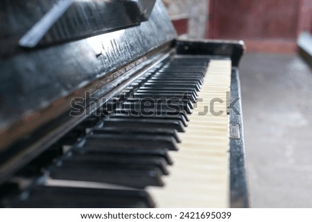 dusty old piano keyboard. High quality photo