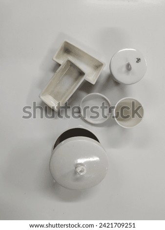 Ceramic Ash cricubles for Coal Ash testing. High precision, Reliable results Royalty-Free Stock Photo #2421709251