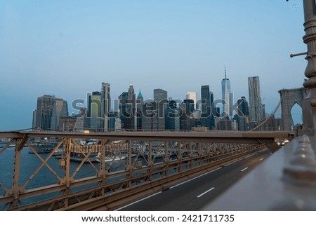 Roadbed of the Brooklyn Bridge with New York skyscrapers in the background