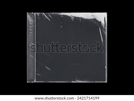 CD case on black background. Isolated transparent disk mockup. Clean cover box template.