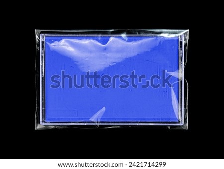 Cassette tape case on black background. Isolated transparent mockup. Clean cover box template. Royalty-Free Stock Photo #2421714299