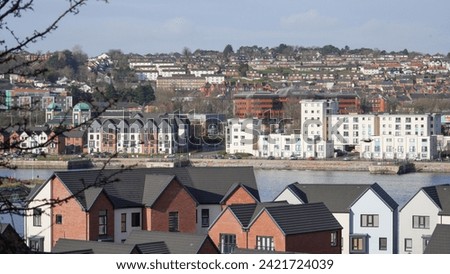Barry, Vale of Glam, Wales Feb 02 2024: Looking down over the waterfront from Barry Island.New build homes and apartments built on disused dock land have transformed the site from industrial to urban.