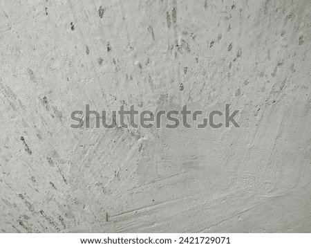 cement floor and patterns created by the splashing and splashing of water
