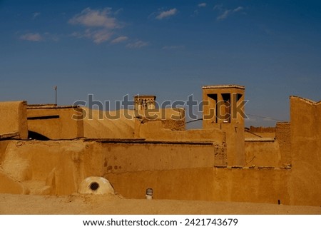 Historic city of Yazd with famous wind towers. Old step with traditional clay arches in the city of Yazd, Iran