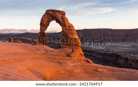 United States. Utah. Arches National Park. Delicate Arch.Delicate Arch is a 65 ft (20 m) tall natural arch. It is the most widely-recognized landmark in Arches National Park. Royalty-Free Stock Photo #2421764917