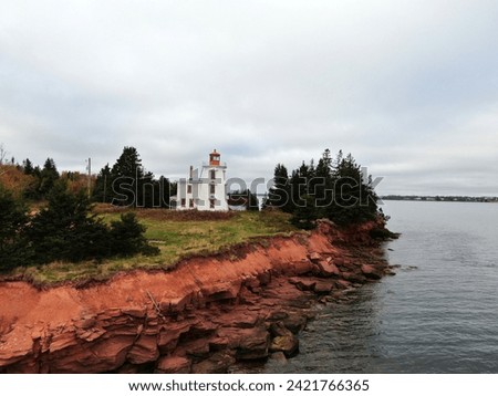 Lighthouse at Blockhouse in Prince Edward Island Royalty-Free Stock Photo #2421766365