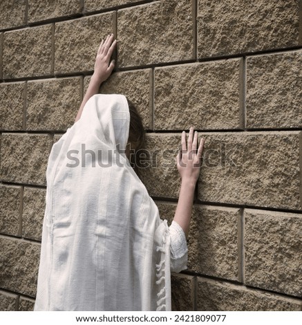 Misery lost bad worry feel mourn grief weep mood young lone holy jew teen lady Mary hand ask god faith hope. Old retro history biblic adult alone human male fail white islam veil templ home text space Royalty-Free Stock Photo #2421809077