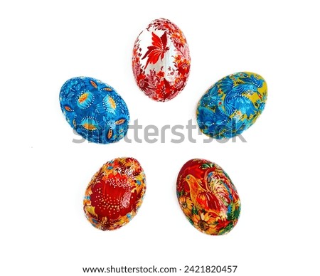 Ukrainian Easter eggs with Petrykivka painting. Isolated on a white background. Hand painted wooden decor. Small gift for mom.