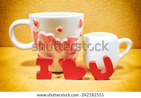 A cup of love with " I LOVE YOU " symbol