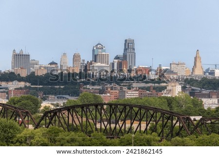 Bridge framed summer view of the downtown skyline of Kansas City, Missouri, USA.