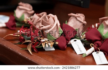 Flowers for Groomsman to put in their lapels Royalty-Free Stock Photo #2421886277