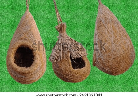 Artificial bird nests image. Naturally making bird nest picture.  Artificially made bird nest. Royalty-Free Stock Photo #2421891841