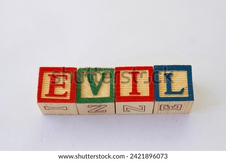 The term evil displayed visually on a clear background with copy space