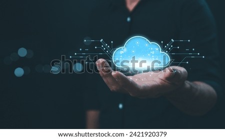 Hand touching cloud computing with download sign, cloud computing diagram shown in technology storage concept, symbol for technology transformation and sharing concept. Cloud computing concept.