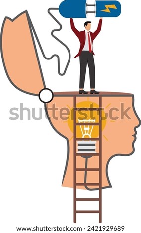 Businessman with electrical plug and socket plugging in the idea light bulb