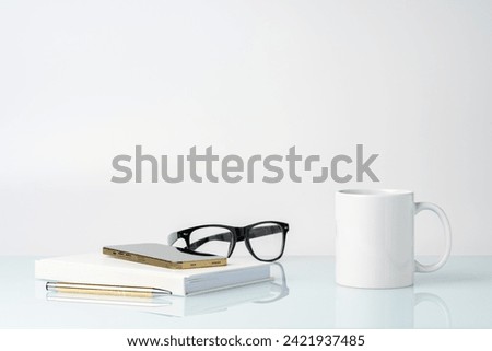 Coffee mug on white office table mock up