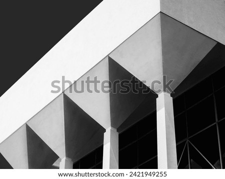Concrete columns white cement geometric pattern shade shadow Architecture details  Royalty-Free Stock Photo #2421949255