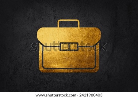 Gold Abstract Bag or Folder Stationery Icon on a Black Background.