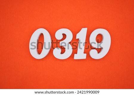 Orange felt is the background. The numbers 0319 are made from white painted wood.