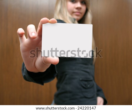 business card in hands at a girl