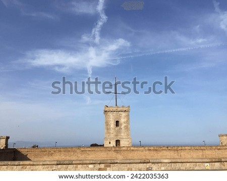 Montjuïc Castle in Barcelona, Spain.Tower with view to the blue sky.