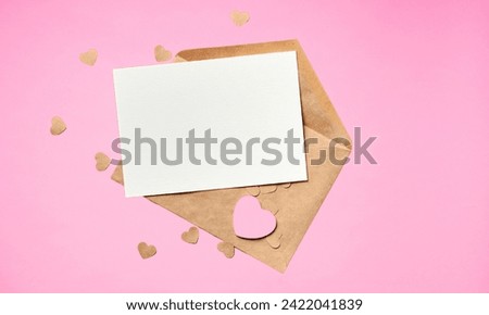 Valentine's Day card with hearts paper cut style isolated on a pink background. Greeting card