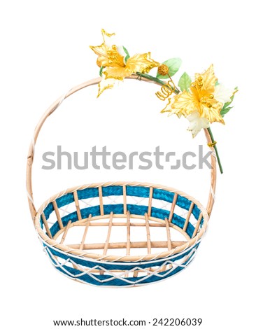 Empty wicker basket with flower on white background.