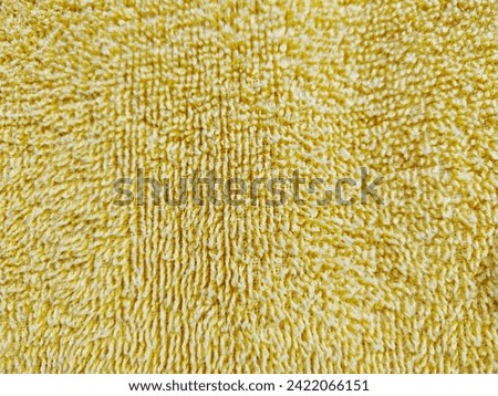 Close up photo of yellow seamless fabric texture