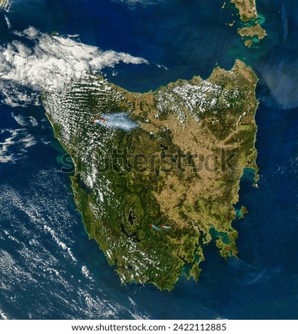 Fires in Tasmania. . Elements of this image furnished by NASA.