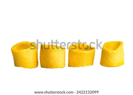 Four Potato hoop shaped snacks isolated on a white background