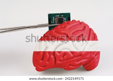 On a white background, a model of the brain with a picture of a flag - Latvia, a microcircuit, a processor, is implanted into it. Close-up