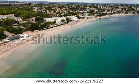 Drone photo of italian beach with buildings.