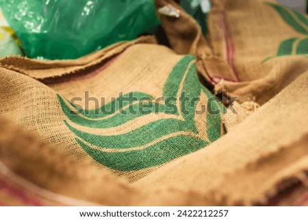 jute bags of brazilian coffee, imported speciality green beans Royalty-Free Stock Photo #2422212257