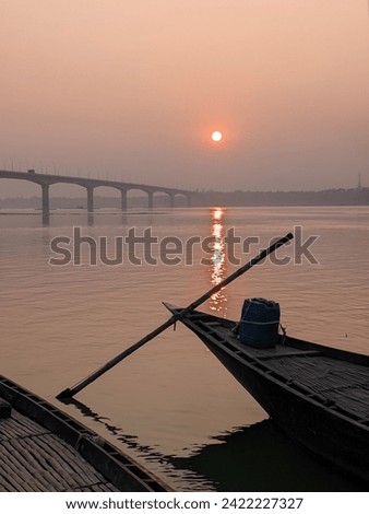 Sunset on the river and boat barriers on the river | Beautiful Sunset Picture | Beautiful River Photo | Background Wallpaper Pic