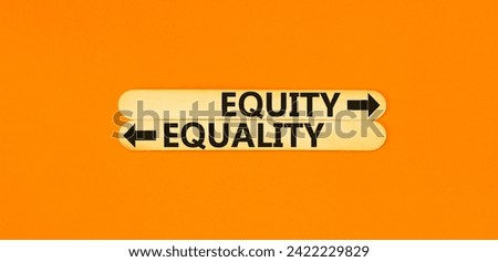 Equity or equality symbol. Concept word Equity or Equality on beautiful wooden stick. Beautiful orange table orange background. Business and equity or equality concept. Copy space.