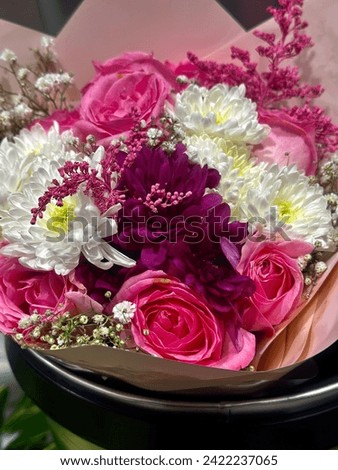 Stock of Natural artificial mixed colors Red Roses dark pink  color beautiful Roses floral view love symbols valentines special  bouquet with green leafy background