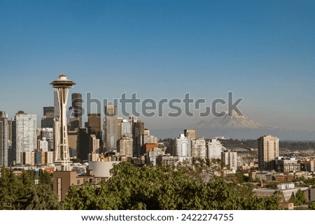 Seattle skyline with Space Need in foreground and Mt. Ranier in distance.
