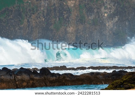 ocean water crashing on the rocky coast